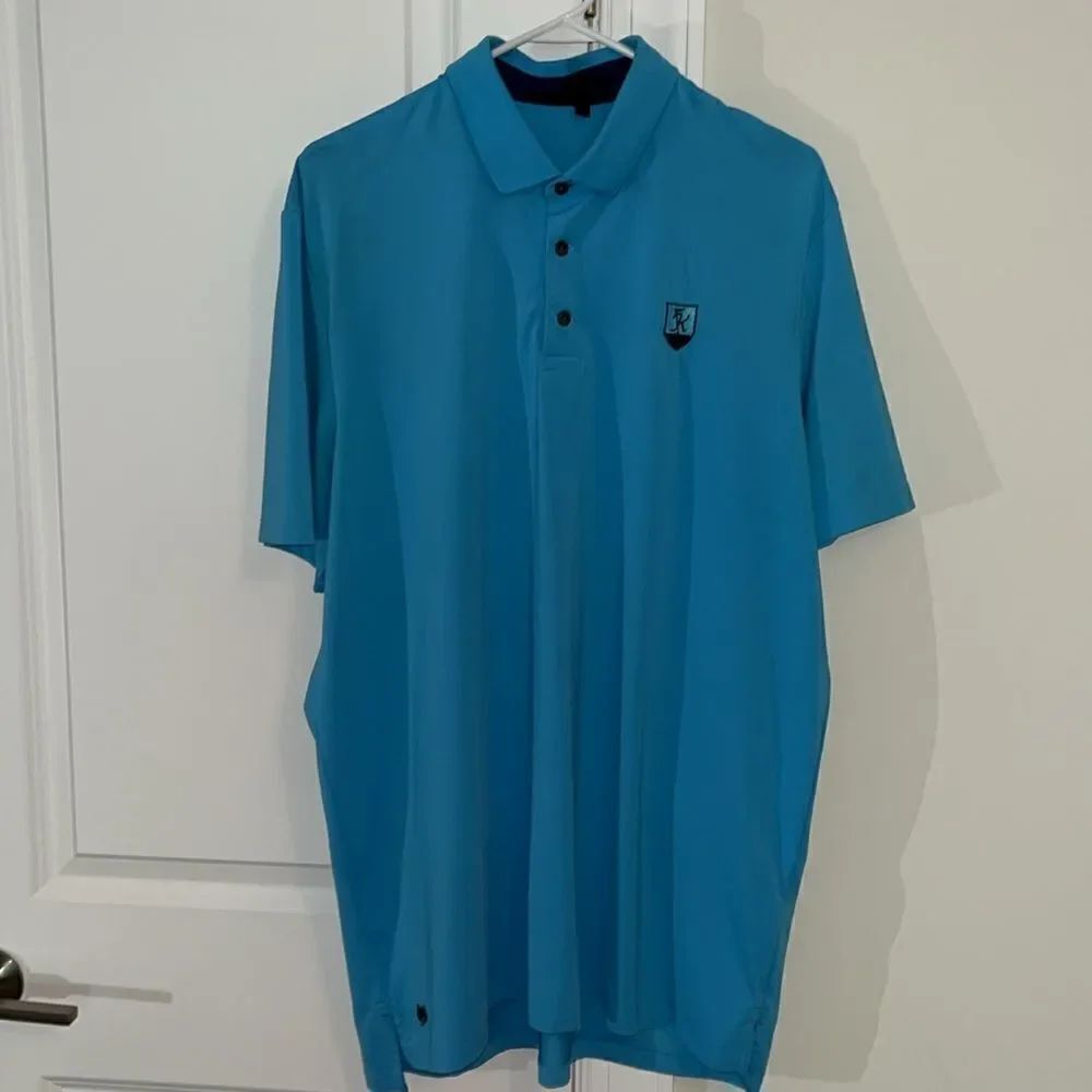 Carolina blue Kalamazoo Country Golf Wolves GREYSON by Justin Thomas Polo Shirt